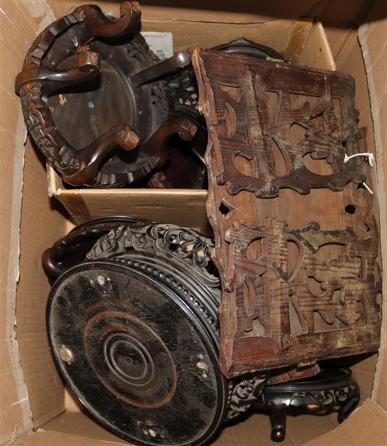 Collection of Chinese carved and pierced hardwood stands, a carved and pierced wood bookslide and a small folding shelf